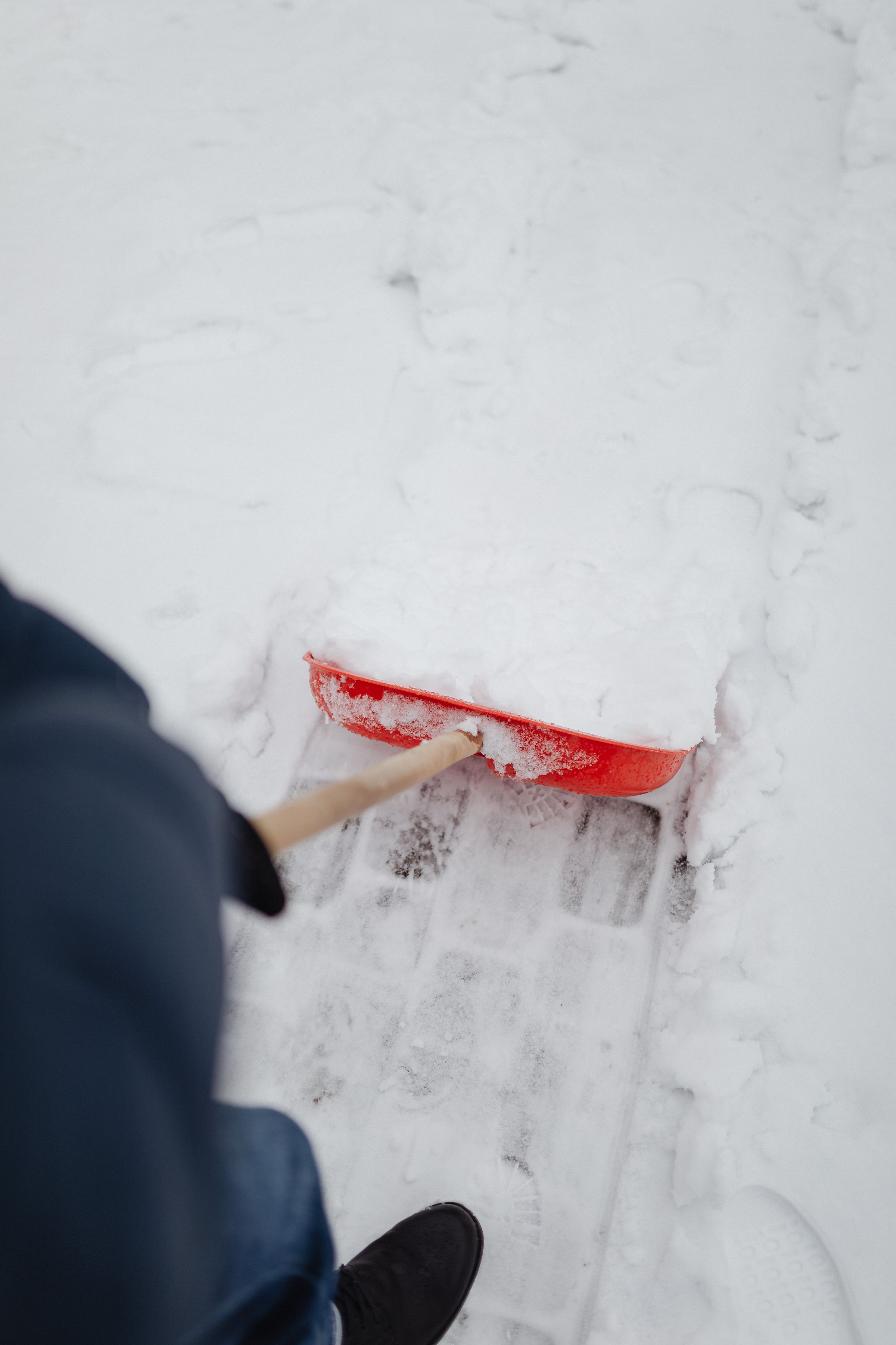Shoveling snow from a walk
